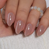 Curvlife uñas postizas media almendra nude con efecto galaxia ojo de gato para un look atrevido.