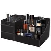 Decorcode organizador-vanidad negro con cajones para ordenar cosméticos.