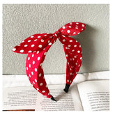 Deghew diadema lazo rojo lunares frente, perfecto para completar un estilo retro en fiestas.
