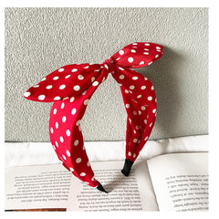Deghew diadema lazo rojo lunares frente, perfecto para completar un estilo retro en fiestas.