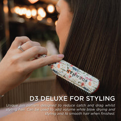 Denman D3 mango ergonómico para un agarre cómodo y control preciso.