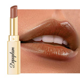 Depuplum brown lipstick closeup shows a glossy, hydrating finish.