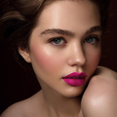 Depuplum DM06 Dream Pink matte finish appears smooth on lips.