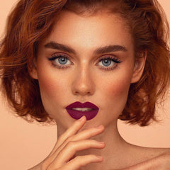 Depuplum DM07 Magenta Love lipstick swatch showing deep plum velvet texture.