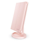 Miroir Deweisn tri-fold illuminé sur table pour maquillage précis.