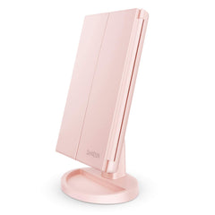 Miroir Deweisn tri-fold illuminé sur table pour maquillage précis.