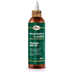 Difeel aceite romero-menta en botella para revitalizar el cabello.