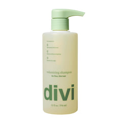 Divi Volumen Shampoo botella en lavabo para uso diario y limpieza suave.
