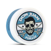 Don Juan pomada con sal marina, enfoque en empaque compacto para viaje.