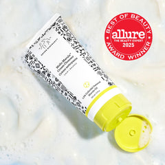Drunk Elephant Mello Marula Cream Cleanser, etiqueta cercana, ingredientes calmantes visibles.