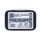 Duke Cannon Colonia sólida: botella con vetiver y musgo de roble para uso diario