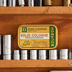 Duke Cannon solid cologne balm texture melts for precise application.