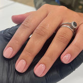 Uñas postizas Dulyork nude-rosado con acabado liso para look natural.