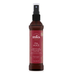 Earthly Body MKS eco Oil Original bottle close-up showing premium hair nourishment.
