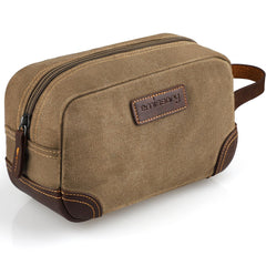 Emissary bolsa de aseo en cuero y lona, ideal para organizar artículos de viaje.