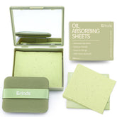 Hojas absorbentes de Erinde con espejo y aplicador suave para retoques discretos.