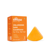Ethique volumizing conditioner bar close-up highlighting biotin for added lift.