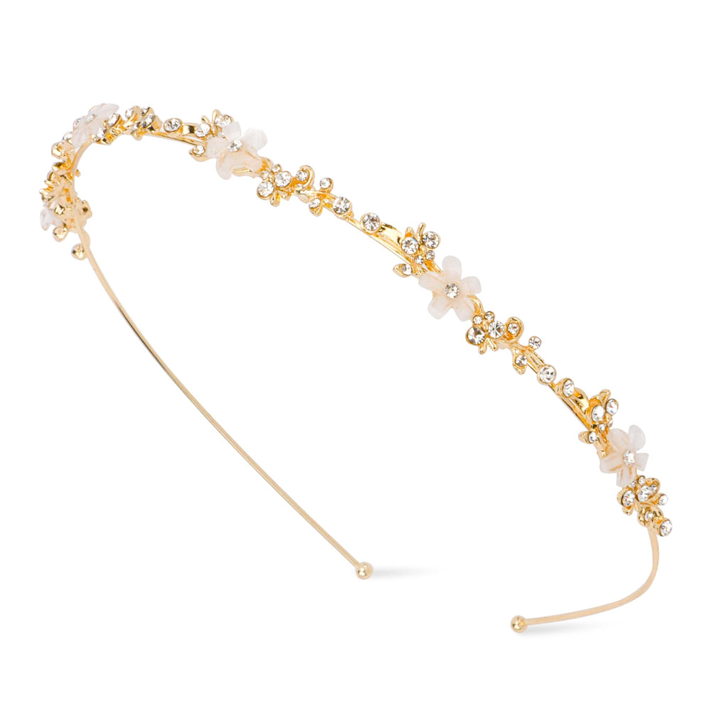Diadema dorada Exacoo con flor y cristales, perfecta para novias que buscan elegancia.