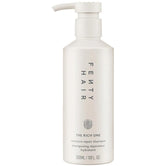 FENTY BEAUTY The Rich One Moisture Repair Shampoo bottle with a luxurious ambery-floral scent and color-safe care.