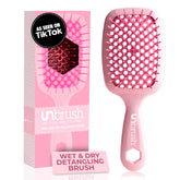 UNbrush de FHI Heat, frente del peine rosa, diseño ergonómico para peinado suave.