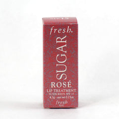 Fresh Sugar Lip Treatment SPF 15 Rose swatch shows creamy texture and color.