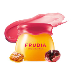 FRUDIA bálsamo labial granada miel – empaque elegante para el cuidado diario.