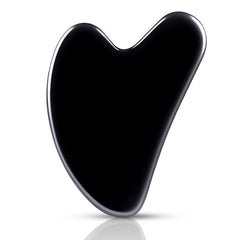 Guasha de FUIYOOCEN en obsidiana natural para un contorno facial suave y efectivo.