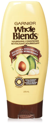 Garnier Whole Blends botella con aceite de aguacate, ideal para cabello muy seco.