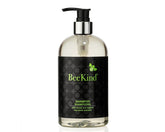 Gilchrist & Soames BeeKind shampoo bottle on shelf for gentle cleansing.