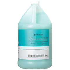 Ginger Lily Farms Club & Fitness body wash lather on skin for silky softness.