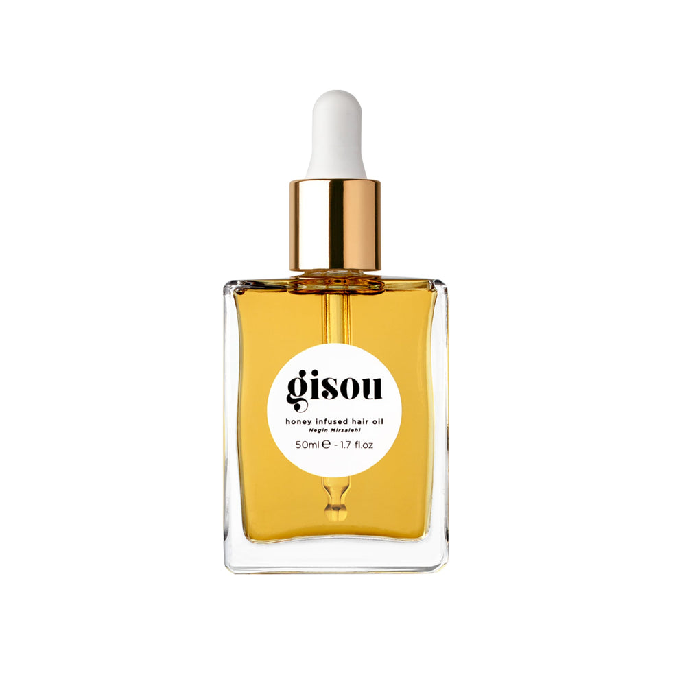 Gisou Aceite capilar miel infundido en botella para hidratación ligera.