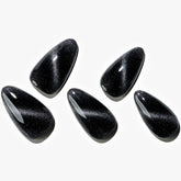 GLAMERMAID Black Cat Eye nails in almond close-up for salon-grade finish