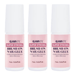 Glamnetic three-bottle brush-on nail glue set, compact and organized.
