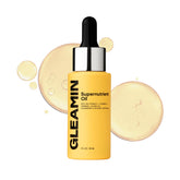 Gleamin Aceite Facial Iluminador en frasco, brillo y hidratación visibles.