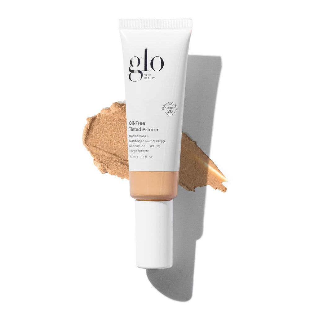 Glo Skin Beauty primer tintado sin aceite con SPF 30 en botella para rostro suave.