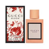 Gucci Bloom mini EDP, botella elegante para llevar en bolso y perfumar cualquier momento.