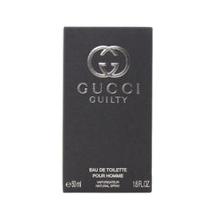 Gucci Guilty para hombre, frasco detalle, aroma sofisticado para uso diario.