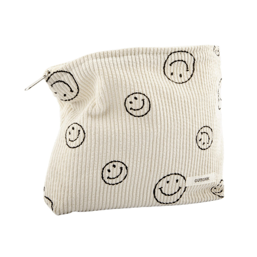 Cartera de maquillaje GUTGNK en pana beige, vista frontal para organización diaria.