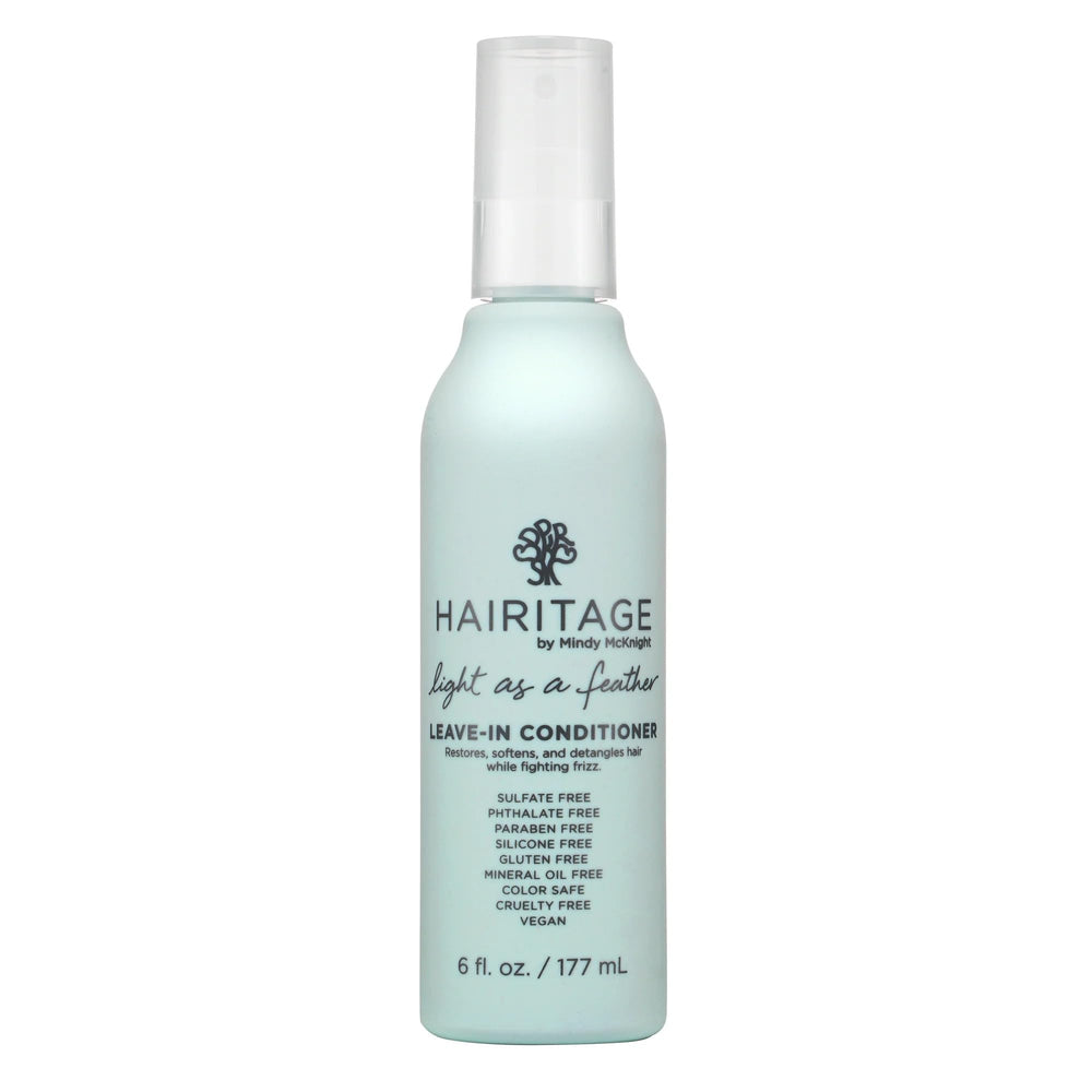 Hairitage Detangling Spray en botella de aplicación facilita el desenredo diario