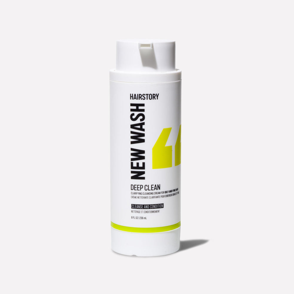 Hairstory New Wash Deep Clean bottle pours to cleanse hair without detergents
