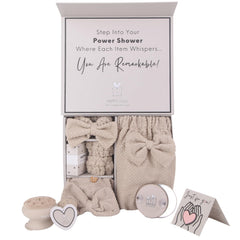 Happy Lolli conjunto ducha regalo beige dentro de una caja elegante.