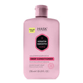 Botella de HASK Keratina para cabello suave y sin frizz.