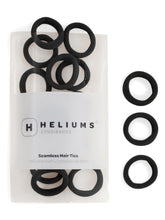 Gomas de pelo Heliums pequeñas negras para peinados suaves y sin tirones.