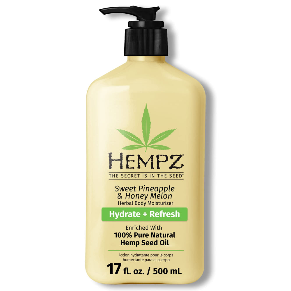 Hempz Loción corporal: botella con fragancia de piña y melón para piel suave.