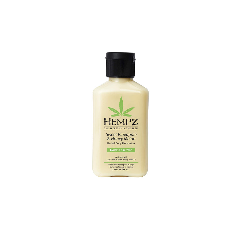 Hempz Loción corporal en frasco, hidrata y deja piel suave con aroma tropical.