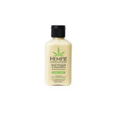 Hempz Loción corporal en frasco, hidrata y deja piel suave con aroma tropical.
