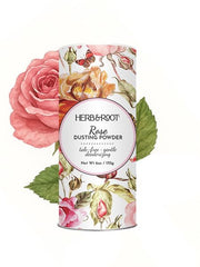 Herb & Root polvo corporal sin talco rosa para piel suave y aroma ligero.