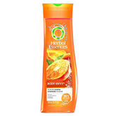 Shampooing Herbal Essences Body Envy, bouteille en premier plan offrant du volume.