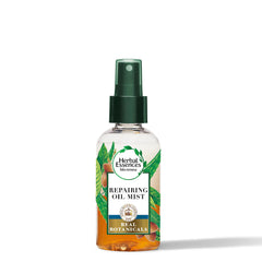 Botella Herbal Essences Renew Aceite en Mist con argán y aloe para reparación suave.
