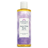 Botella de Heritage Store Aura Glow, aceite corporal rosa para hidratación diaria.